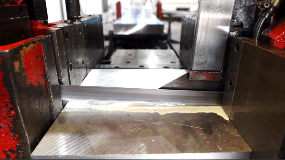 Bandsaw blade cutting metal