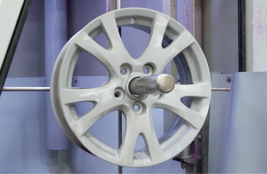 Alloy wheel stripped by wet blasting
