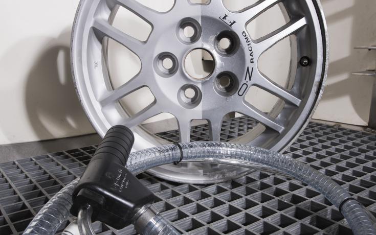 Alloy wheel in a wet blast cabinet