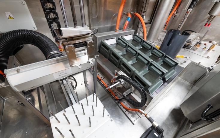 Sedimentation tank filtration within a Vapormatt Oncilla automatic wet blasting machine