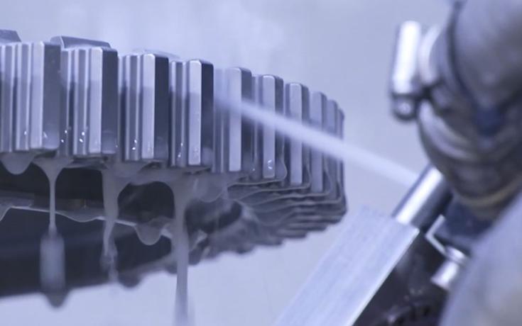 Micro gun from the Vapormatt Leopard Cub automatic wet blasting machine in action