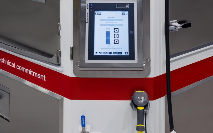 The HMI and bar code scanner on a Vapormatt Sabre automatic wet blasting machine