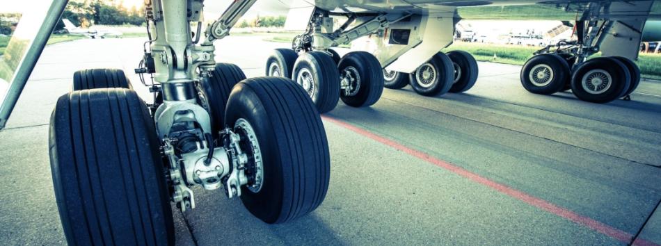 Forged landing gear struts and beams