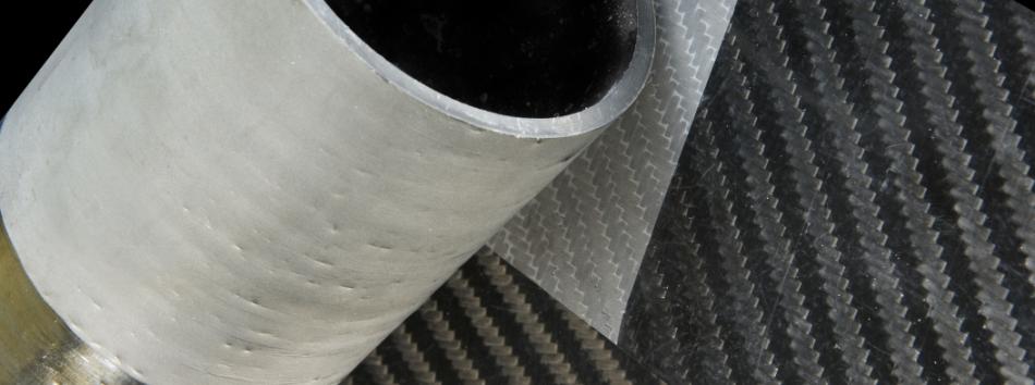 Sheets and rolls of composite material