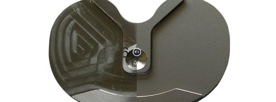 Part of a knee implant before and after wet blasting