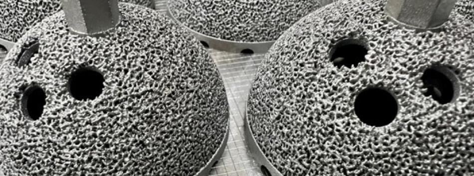 Additive manufactured hip implants