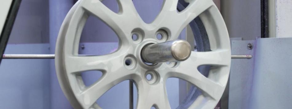 Alloy wheel stripped by wet blasting