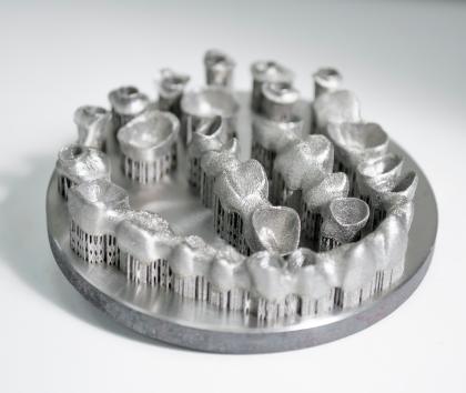 Additive manufactured dental crowns