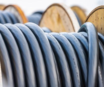 Encapsulated cable on reels