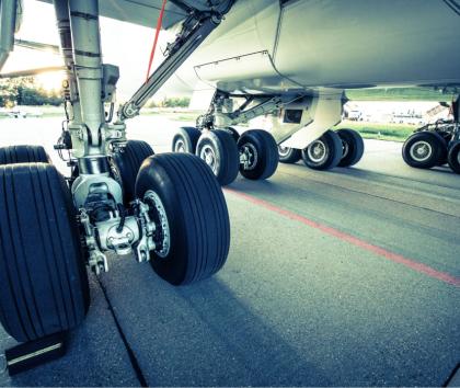 Forged landing gear struts and beams