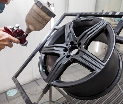 Alloy wheel being resprayed