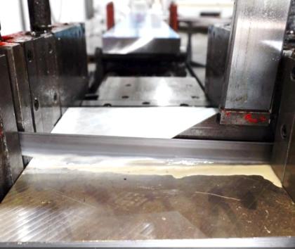 Bandsaw blade cutting metal