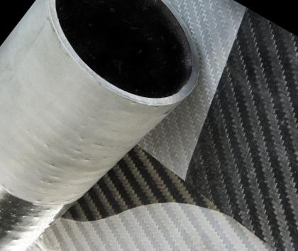 Sheets and rolls of composite material