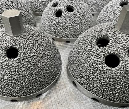 Additive manufactured hip implants