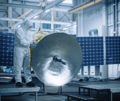 Man working with satellite