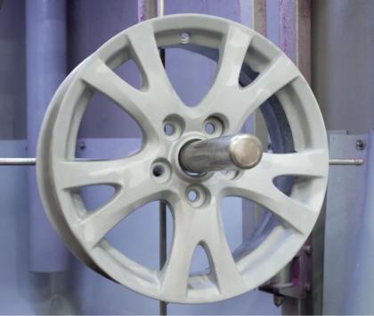 Alloy wheel stripped by wet blasting