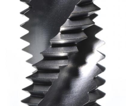 Edge honing of cutting tools, wet blasting