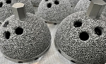 Additive manufactured hip implants