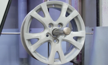 Alloy wheel stripped by wet blasting
