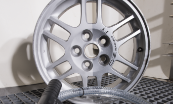 Alloy wheel before and after wet blasting