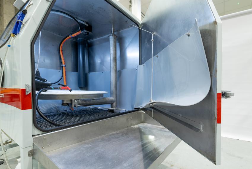 Wide opening door and anti-drip door mechanism