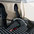 Gloves, blast, rinse, and air guns in a Vapormatt Puma manual wet blasting machine