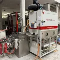Vapormatt Profelis FR automatic wet blasting machine front left view in factory