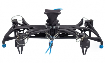 Surface grippers used to move parcels around fully autonomous grocery stores