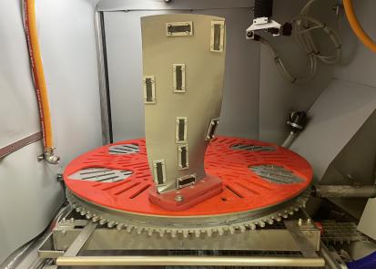 Jet engine fan blade with Almen strips attached