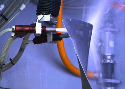Fan blade being peened